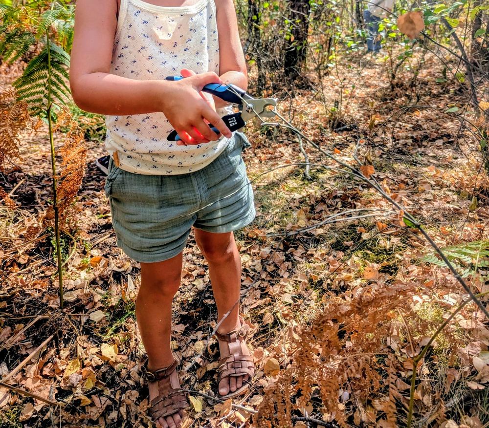 Child taking part in a Forest School workshop
