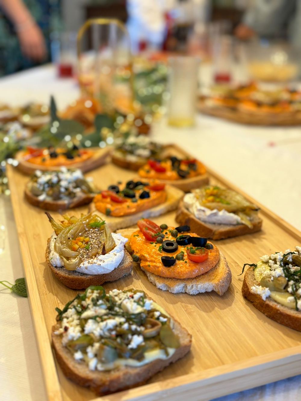 Board of homemade bruschettas served at the mas